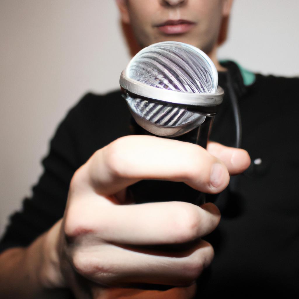Man holding microphone, promoting music